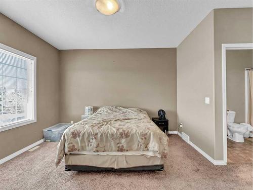 53 Hamptons Way Se, Medicine Hat, AB - Indoor Photo Showing Bedroom