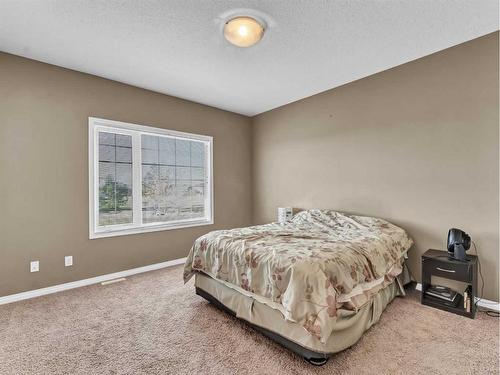 53 Hamptons Way Se, Medicine Hat, AB - Indoor Photo Showing Bedroom