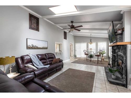 409 3 Street, Rural Cypress County, AB - Indoor Photo Showing Other Room With Fireplace