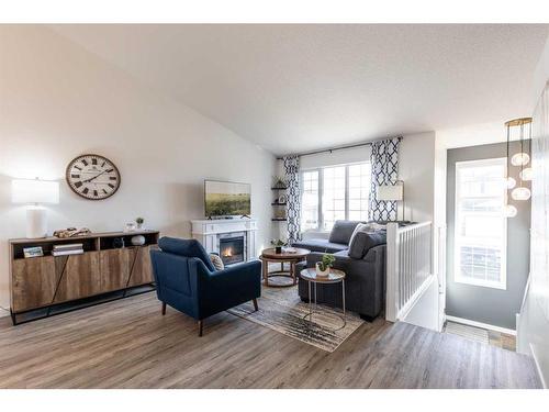 24 Terrace Place Ne, Medicine Hat, AB - Indoor Photo Showing Living Room With Fireplace