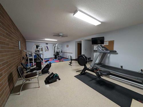 102-3090 15 Avenue Se, Medicine Hat, AB - Indoor Photo Showing Gym Room