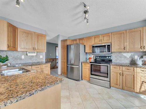 51 Park Meadows Lane Se, Medicine Hat, AB - Indoor Photo Showing Kitchen With Stainless Steel Kitchen With Double Sink