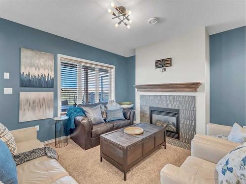 115 Terrace View Ne, Medicine Hat, AB - Indoor Photo Showing Living Room With Fireplace