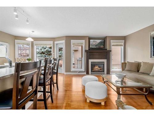 128 Preston Avenue Ne, Medicine Hat, AB - Indoor Photo Showing Living Room With Fireplace