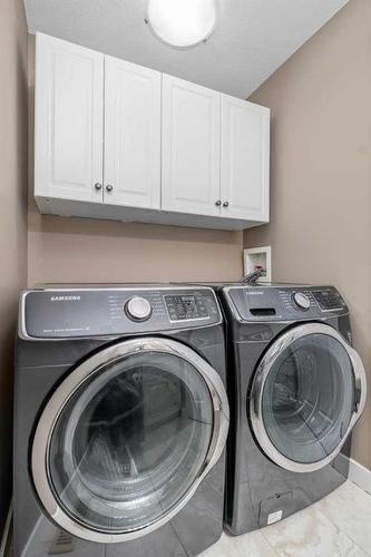 128 Preston Avenue Ne, Medicine Hat, AB - Indoor Photo Showing Laundry Room