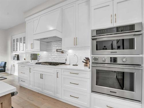 24 Coulee Ridge Drive Sw, Medicine Hat, AB - Indoor Photo Showing Kitchen With Upgraded Kitchen