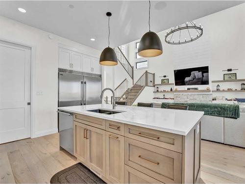 24 Coulee Ridge Drive Sw, Medicine Hat, AB - Indoor Photo Showing Kitchen With Double Sink With Upgraded Kitchen