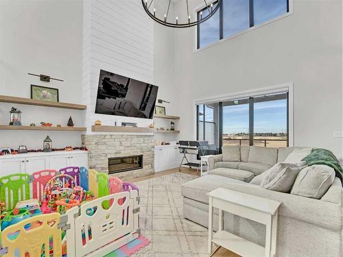 24 Coulee Ridge Drive Sw, Medicine Hat, AB - Indoor Photo Showing Living Room With Fireplace