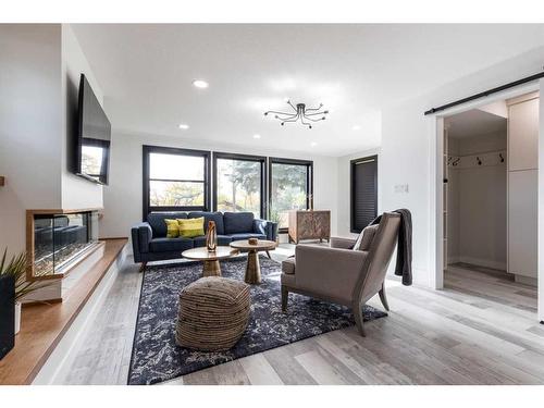 227 12 Street Se, Medicine Hat, AB - Indoor Photo Showing Living Room With Fireplace