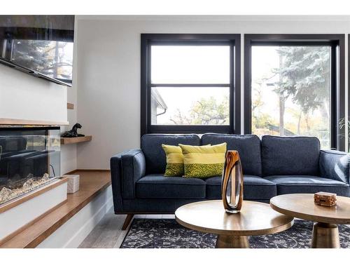 227 12 Street Se, Medicine Hat, AB - Indoor Photo Showing Living Room With Fireplace