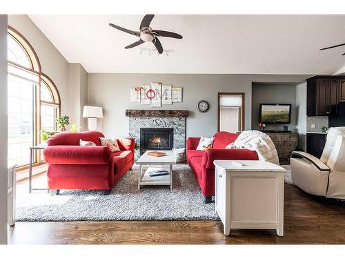 67 Vintage Meadows Place Se, Medicine Hat, AB - Indoor Photo Showing Living Room With Fireplace