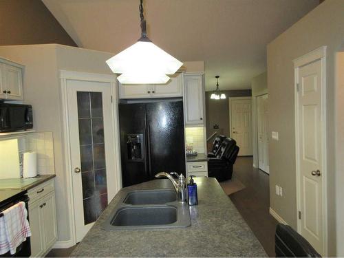 35 Sierra Lane Sw, Medicine Hat, AB - Indoor Photo Showing Kitchen With Double Sink