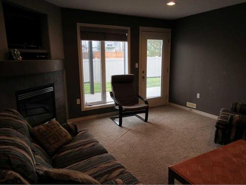 35 Sierra Lane Sw, Medicine Hat, AB - Indoor Photo Showing Other Room With Fireplace