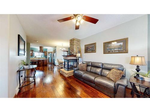 1048 Eagle Ridge Drive, Dunmore, AB - Indoor Photo Showing Living Room With Fireplace