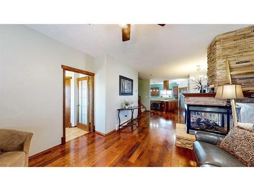 1048 Eagle Ridge Drive, Dunmore, AB - Indoor Photo Showing Living Room With Fireplace