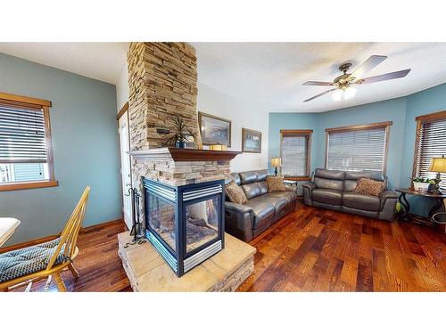 1048 Eagle Ridge Drive, Dunmore, AB - Indoor Photo Showing Living Room With Fireplace