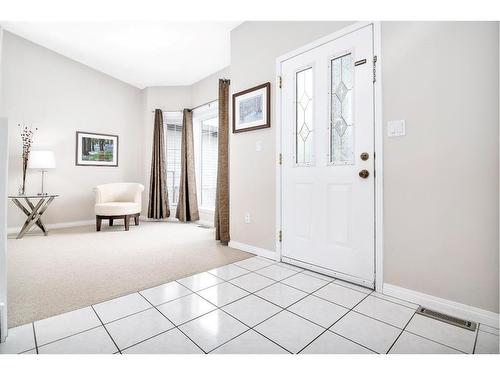 107 Sunset Road Sw, Medicine Hat, AB - Indoor Photo Showing Living Room With Fireplace