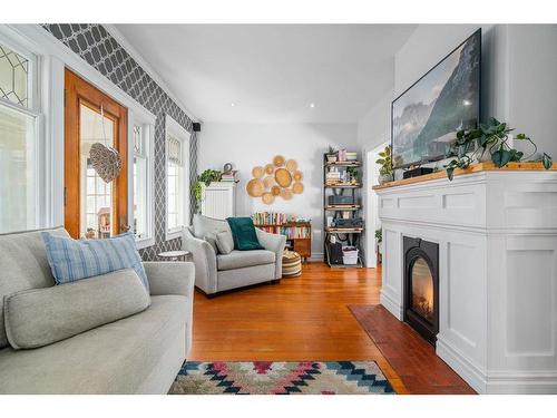 520A 2 Avenue Se, Medicine Hat, AB - Indoor Photo Showing Living Room With Fireplace