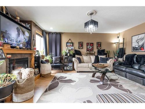 68 Vista Avenue Se, Medicine Hat, AB - Indoor Photo Showing Living Room With Fireplace