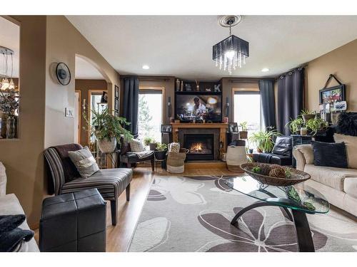 68 Vista Avenue Se, Medicine Hat, AB - Indoor Photo Showing Living Room With Fireplace