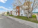 2-85 Sunrise Way Sw, Medicine Hat, AB  - Outdoor With Facade 