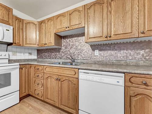 2021 Hawke Crescent Ne, Medicine Hat, AB - Indoor Photo Showing Kitchen With Double Sink