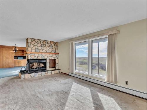 4516 Township Road 130, Rural Cypress County, AB - Indoor Photo Showing Living Room With Fireplace