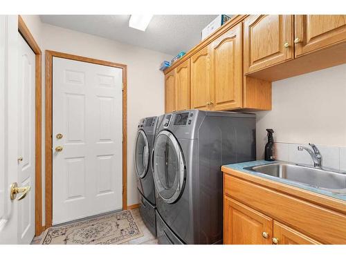 14 Riverview Drive Se, Redcliff, AB - Indoor Photo Showing Laundry Room