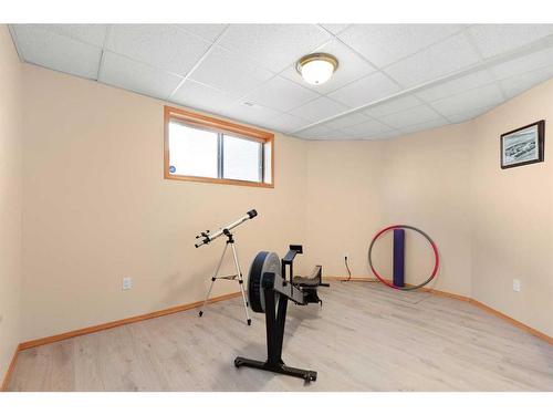 14 Riverview Drive Se, Redcliff, AB - Indoor Photo Showing Gym Room