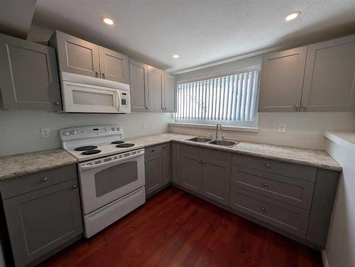 193 Seven Persons Drive Sw, Medicine Hat, AB - Indoor Photo Showing Kitchen With Double Sink