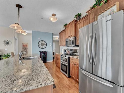 108-85 Terrace Drive Ne, Medicine Hat, AB - Indoor Photo Showing Kitchen With Double Sink