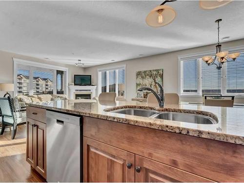 108-85 Terrace Drive Ne, Medicine Hat, AB - Indoor Photo Showing Kitchen With Double Sink