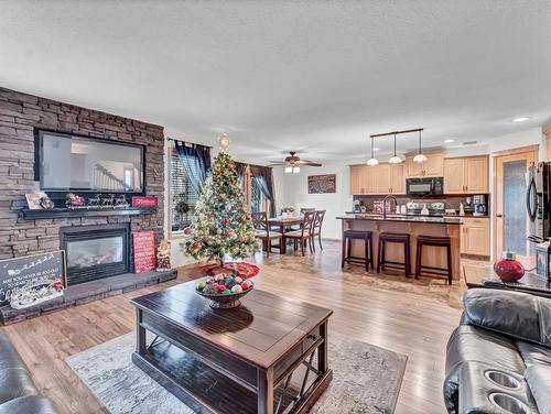 67 Somerset Dale Se, Medicine Hat, AB - Indoor Photo Showing Living Room With Fireplace