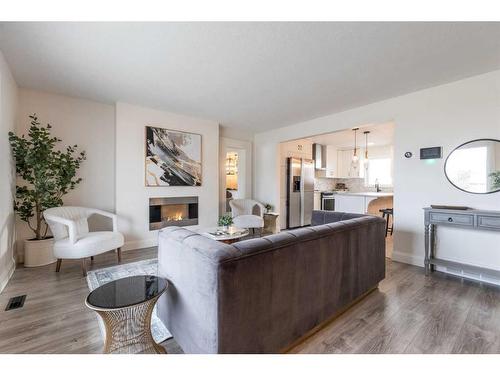 655 8 Street Sw, Medicine Hat, AB - Indoor Photo Showing Living Room With Fireplace