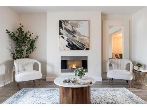 655 8 Street Sw, Medicine Hat, AB - Indoor Photo Showing Living Room With Fireplace