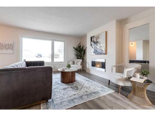 655 8 Street Sw, Medicine Hat, AB - Indoor Photo Showing Living Room With Fireplace