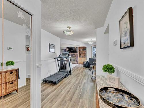 15-1165 16 Street Ne, Medicine Hat, AB - Indoor Photo Showing Gym Room