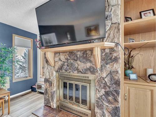 15-1165 16 Street Ne, Medicine Hat, AB - Indoor With Fireplace