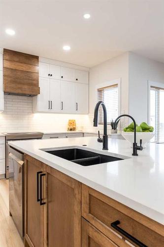 111 Sundance Road Sw, Medicine Hat, AB - Indoor Photo Showing Kitchen With Double Sink With Upgraded Kitchen