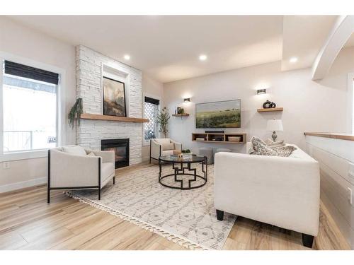 111 Sundance Road Sw, Medicine Hat, AB - Indoor Photo Showing Living Room With Fireplace