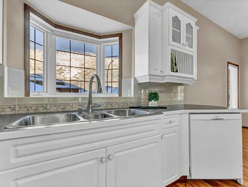 2 Vintage Meadows Court Se, Medicine Hat, AB - Indoor Photo Showing Kitchen With Double Sink