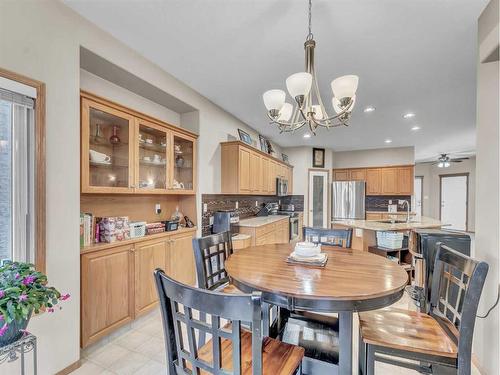 15 Turner Green Se, Medicine Hat, AB - Indoor Photo Showing Dining Room