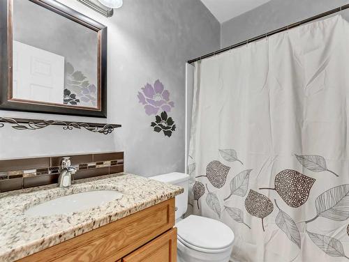 15 Turner Green Se, Medicine Hat, AB - Indoor Photo Showing Bathroom