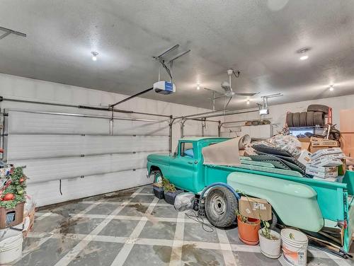 15 Turner Green Se, Medicine Hat, AB - Indoor Photo Showing Garage