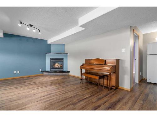 527 Main Street South, Redcliff, AB - Indoor With Fireplace