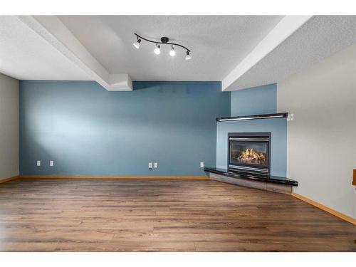 527 Main Street South, Redcliff, AB - Indoor With Fireplace