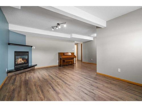 527 Main Street South, Redcliff, AB - Indoor With Fireplace