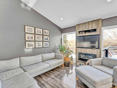 80 Greenwood Court, Medicine Hat, AB - Indoor Photo Showing Living Room With Fireplace