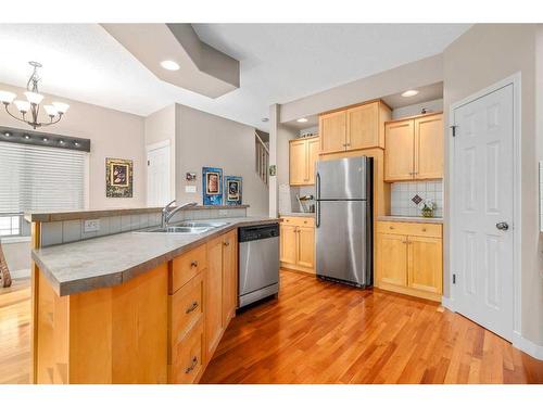 881 Ross Glen Drive Se, Medicine Hat, AB - Indoor Photo Showing Kitchen With Stainless Steel Kitchen With Double Sink