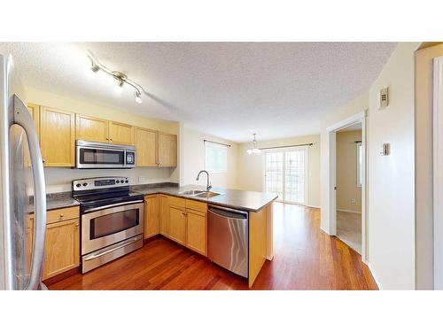 38 Northlands Lane Ne, Medicine Hat, AB - Indoor Photo Showing Kitchen With Double Sink